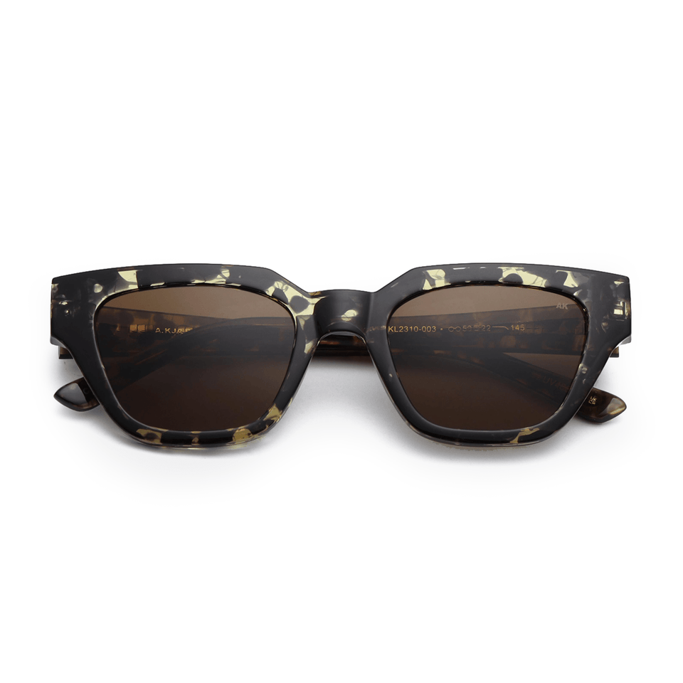 Kaws / Black Yellow Tortoise & Brown Lens Kaws / Black Yellow Tortoise & Brown Lens