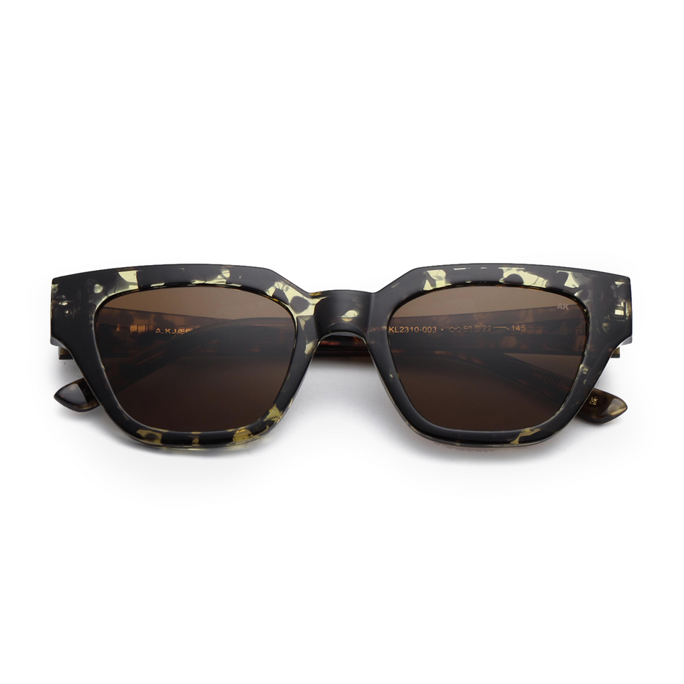 Kaws / Black Yellow Tortoise & Brown Lens